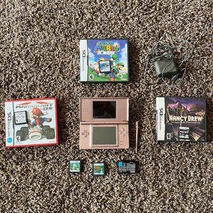 Rose gold Nintendo DS with charger, 5 games and extra battery